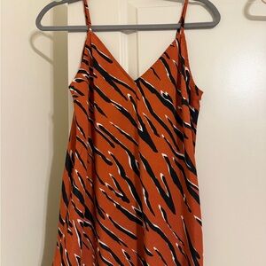 Orange and Black Striped top